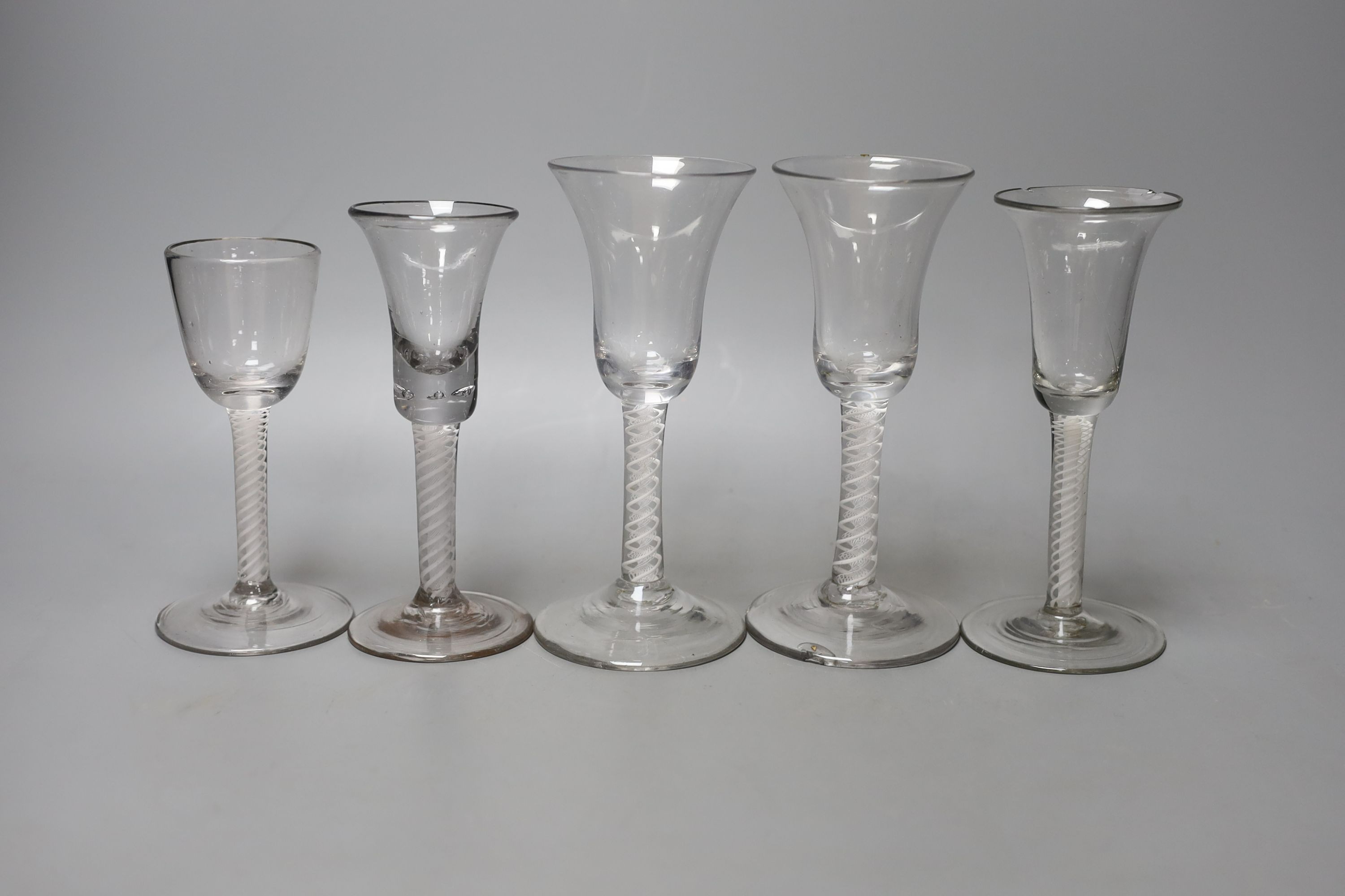 Three George lll opaque twist glasses, tallest 16cm, and two similar Dutch soda glasses